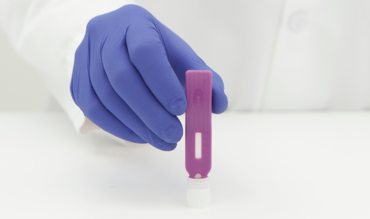 A technician uses a Neogen® Reveal® test to detect allergens, one of many environmental monitoring hazards.